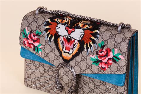 gucci medium shoulder bag with tiger head|Gucci dionysus belt bag.